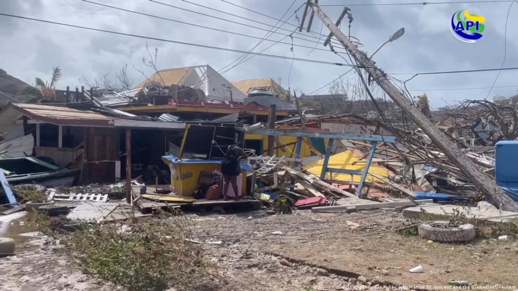 Destroyed houses and a fallen electricity mast due to Hurricane Beryl, in Saint Vincent and the Grenadines, Caribbean.