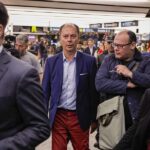 Nicolás Mangiarotti (c), chargé d'affaires at the Argentine embassy in Venezuela, arrives at Ezeiza airport (Buenos Aires).